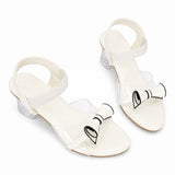 Freeplay Party Wear Block Heel Sandals With Transparent Strap, Bow Embellishment & Elastic Back Strap