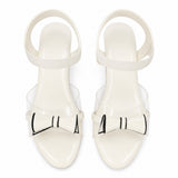 Freeplay Party Wear Block Heel Sandals With Transparent Strap, Bow Embellishment & Elastic Back Strap